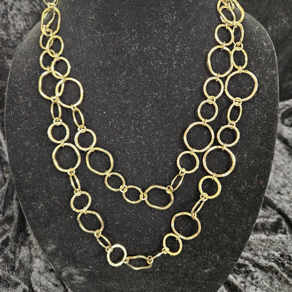 Circular design gold tone necklace 21" length